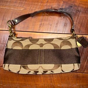 Coach purse, classic tan and brown color and styling, excellent condition.